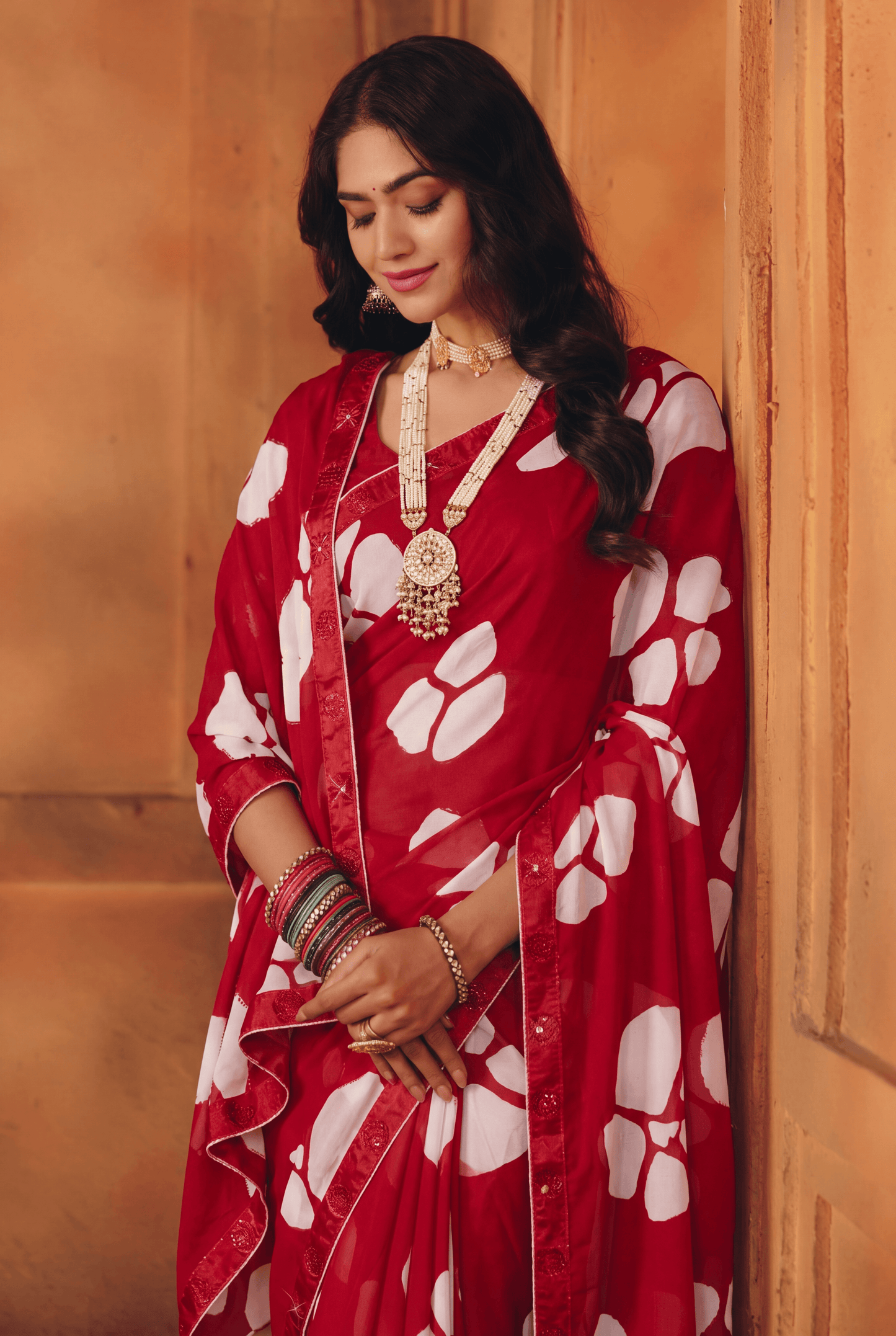 Red Kriva Georgette Saree with Swarovski Crystal Embellishments &amp; Art Silk Lace Blouse Piece